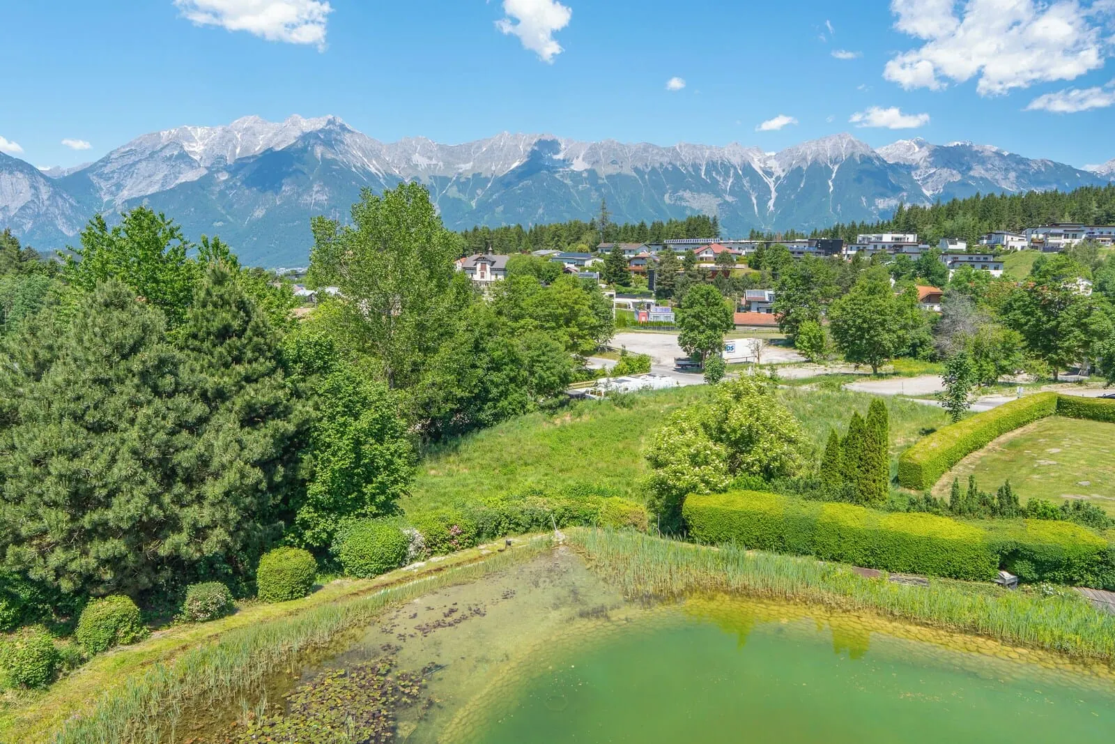 Hotel Gruberhof: The pond and the Nordkette in summer