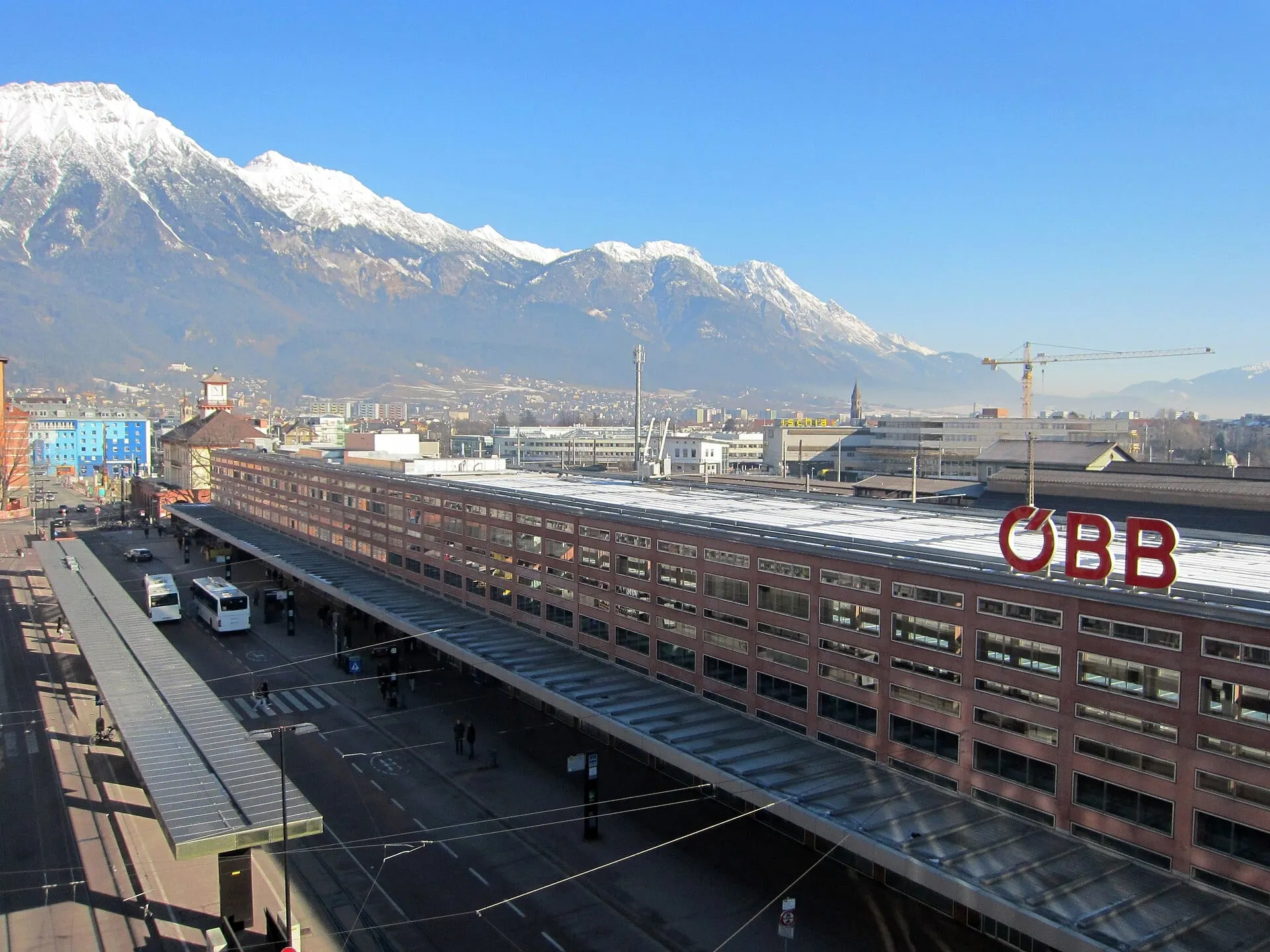 Innsbruck Hauptbahnhof with the snow-covered Nordkette behind