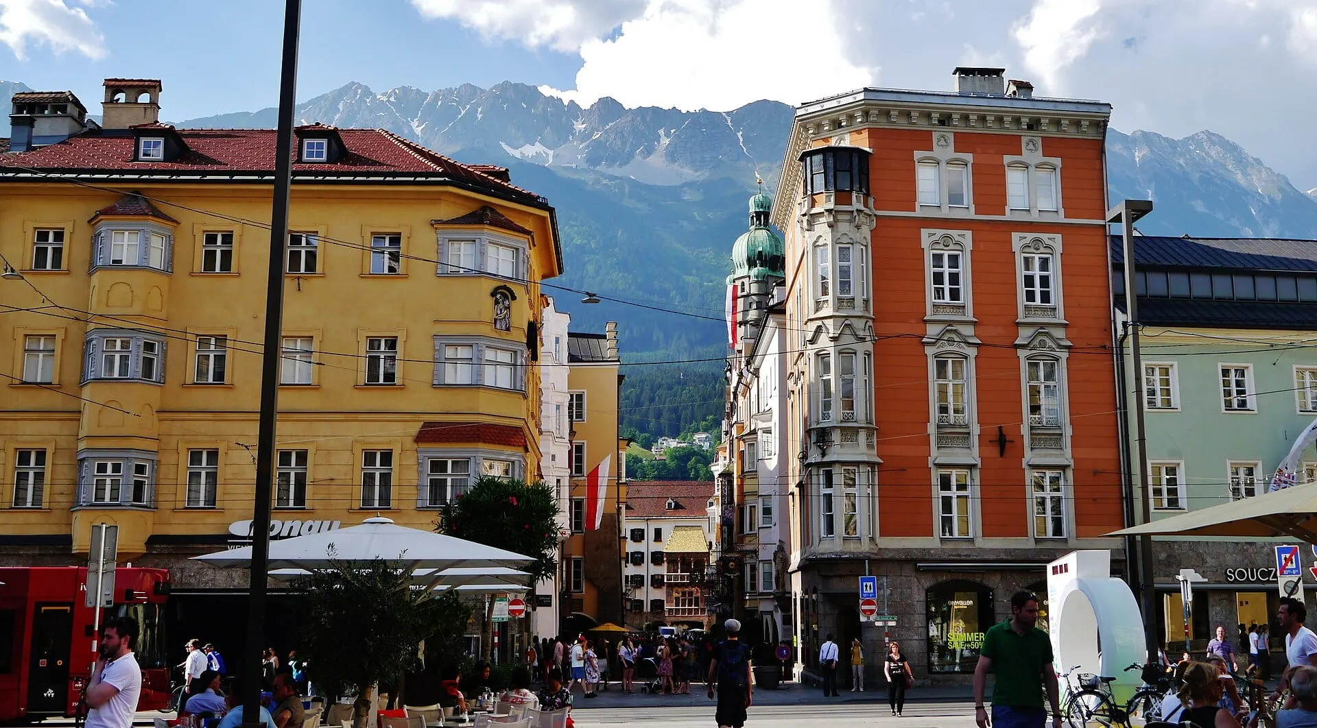 Coloured houses on the edge of Innsbruck's old town, with the Nordkette behind