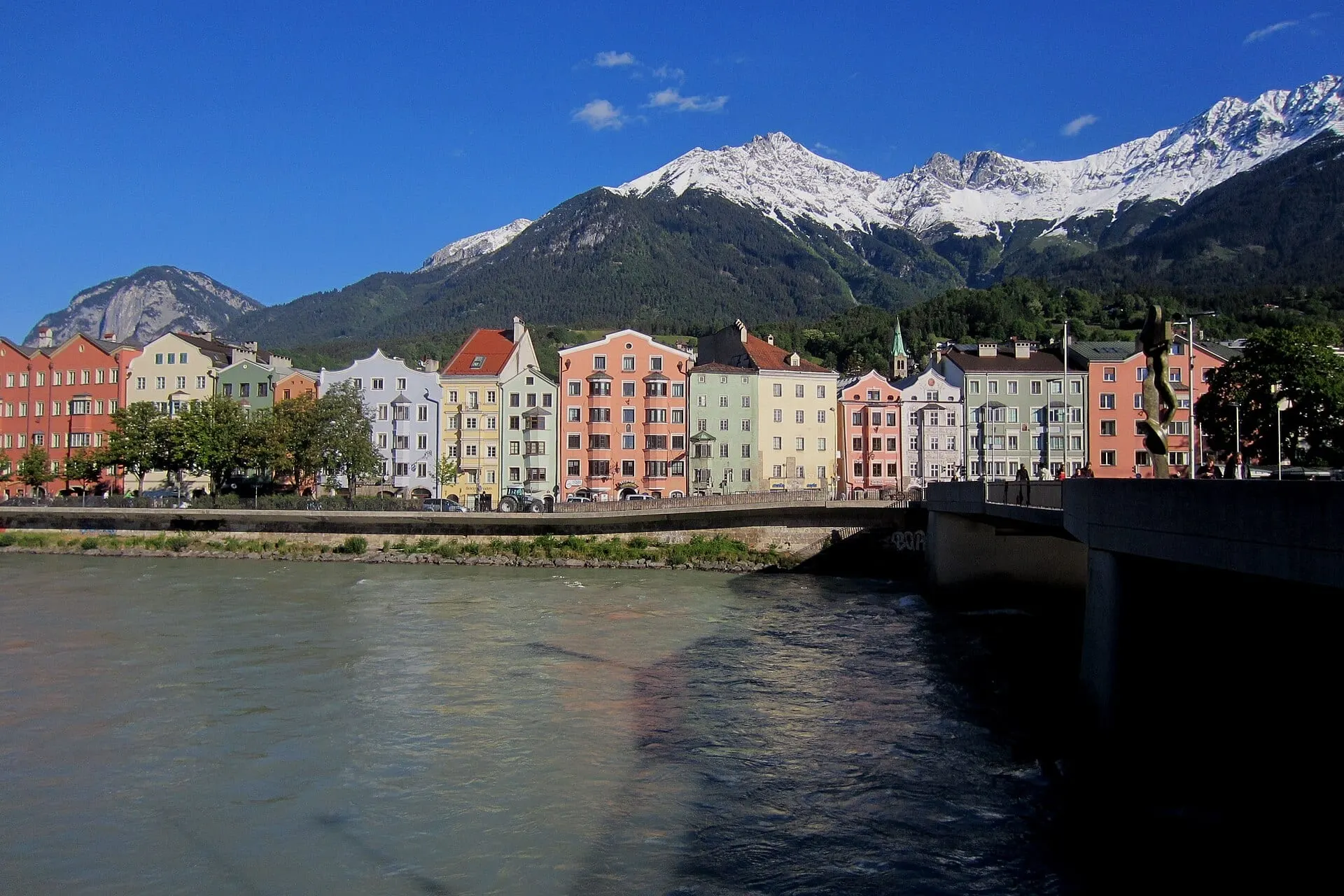 The coloured houses of Mariahilf on the River Inn under the mountains