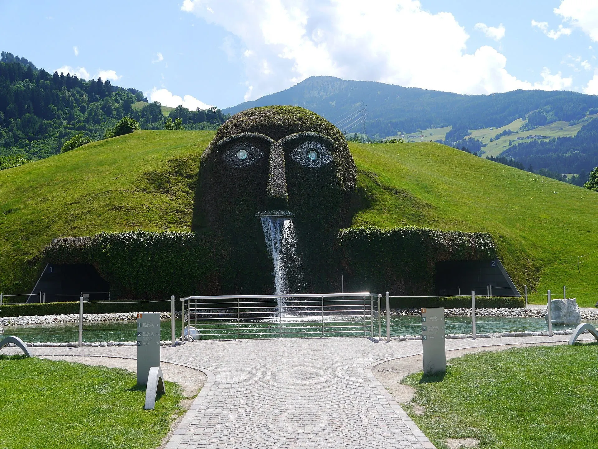 The Giant, the grass-covered head with crystal eyes at the entrance to Swarovski Crystal Worlds