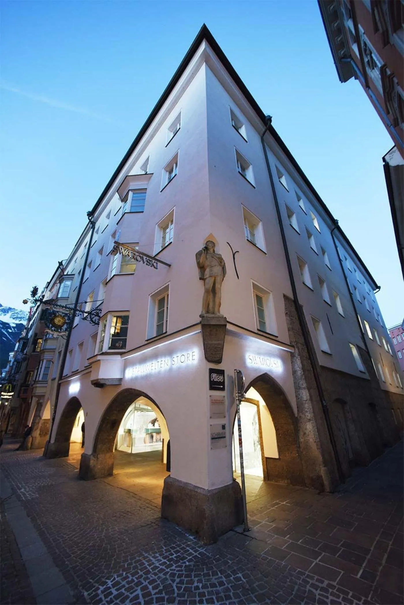 Swarovski store building in Innsbruck old town at dusk