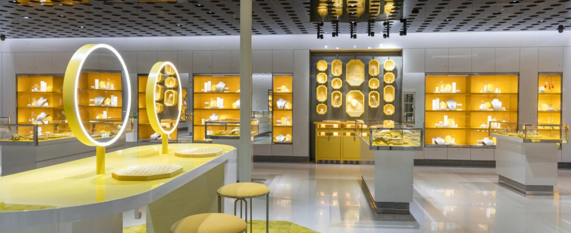 Yellow themed jewellery displays in the Swarovski store