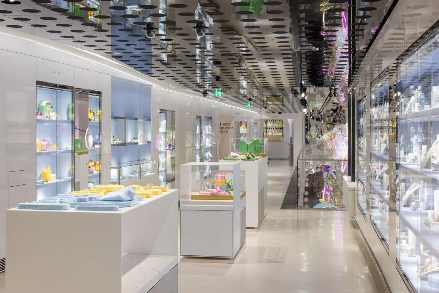 Long gallery of glass display cases in the Swarovski store