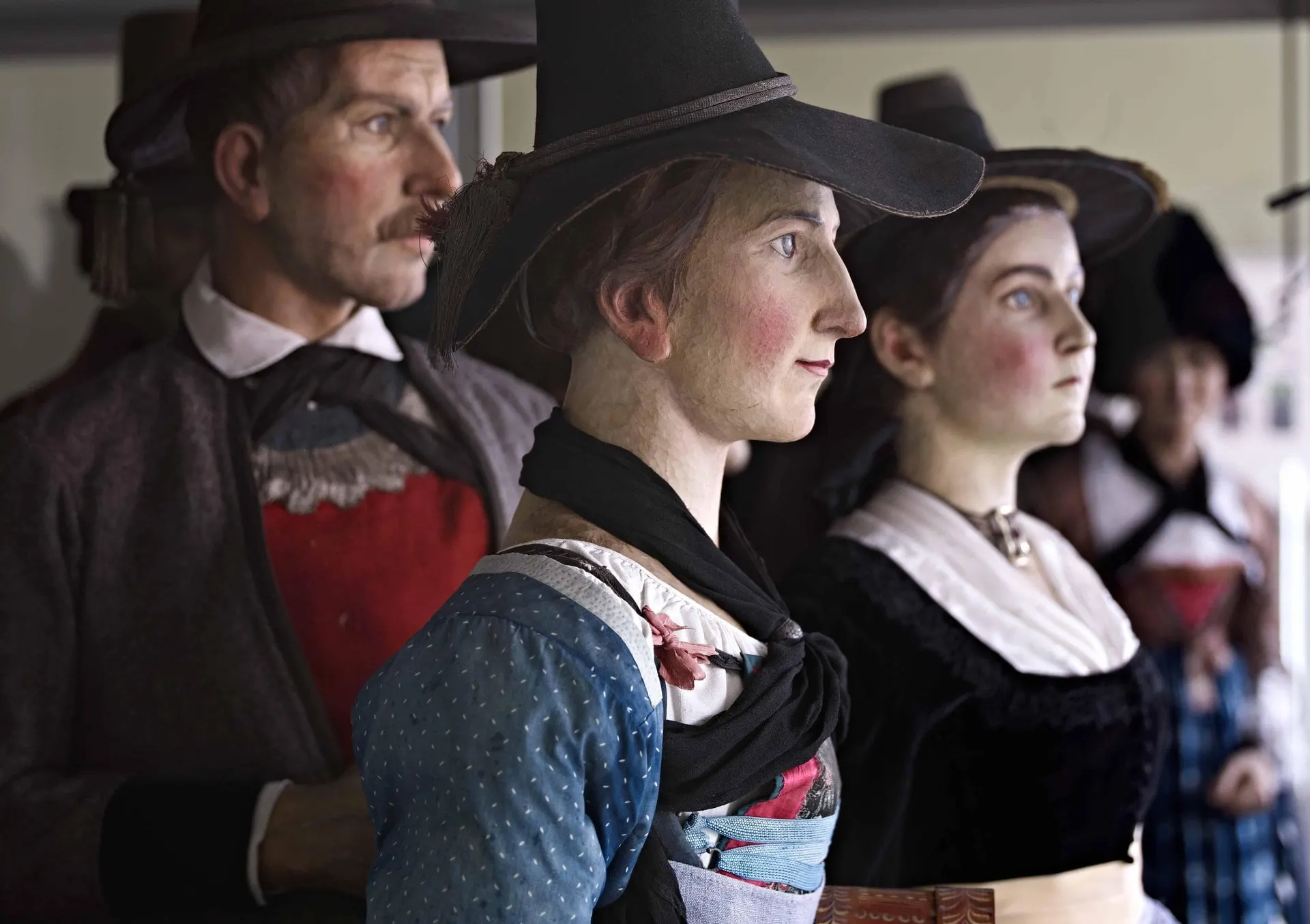 Figures in traditional Tyrolean costume at the Tyrolean Folk Art Museum