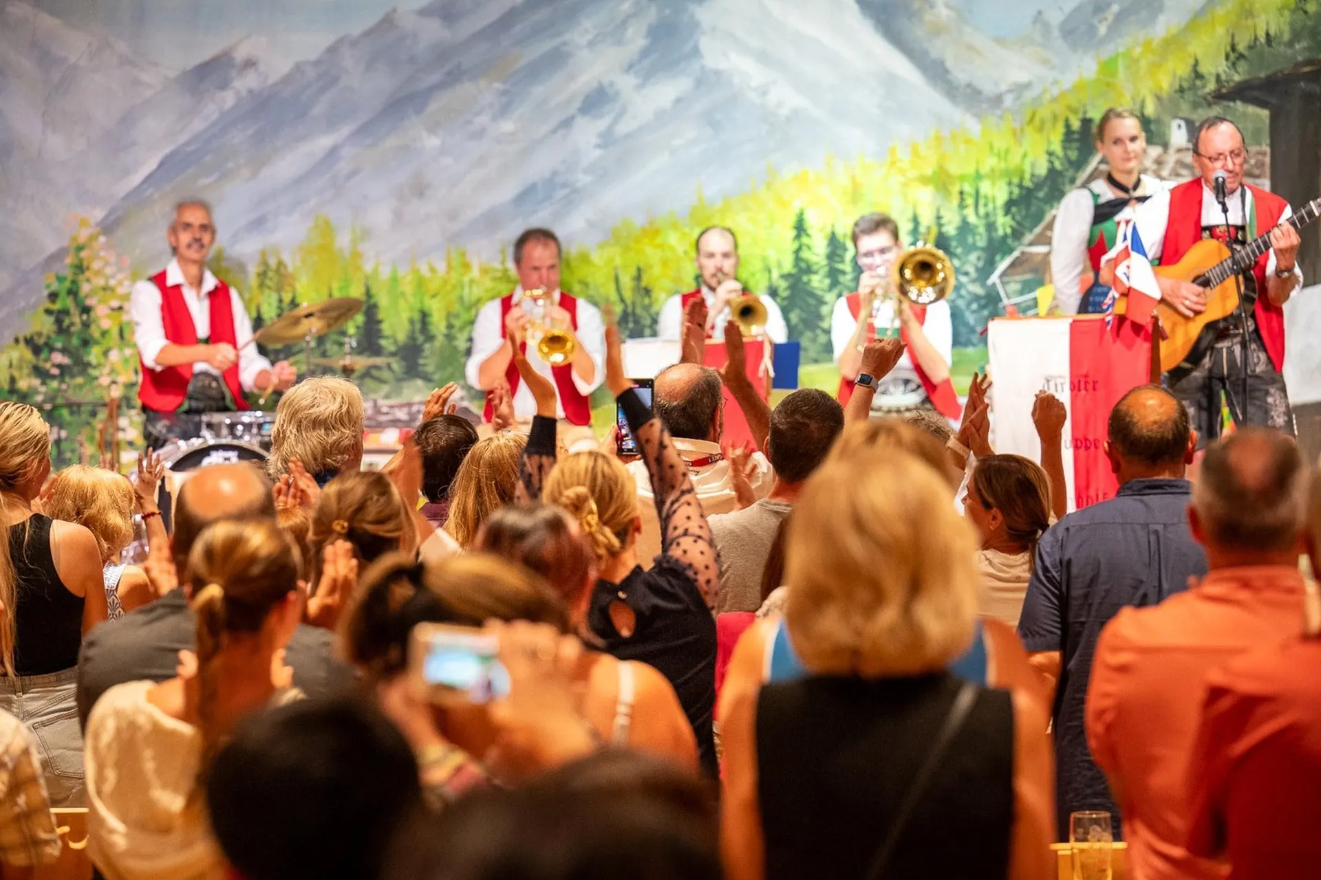 Band in traditional dress playing to the audience at the Tyrolean evening