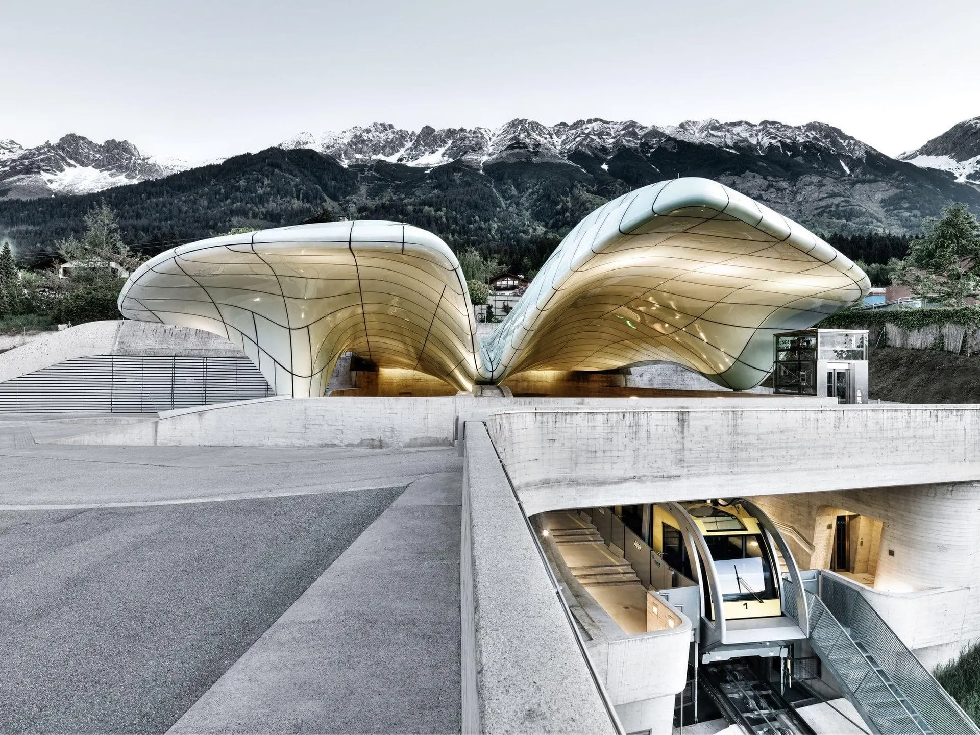 Zaha Hadid's Hungerburg funicular station with the Nordkette peaks behind