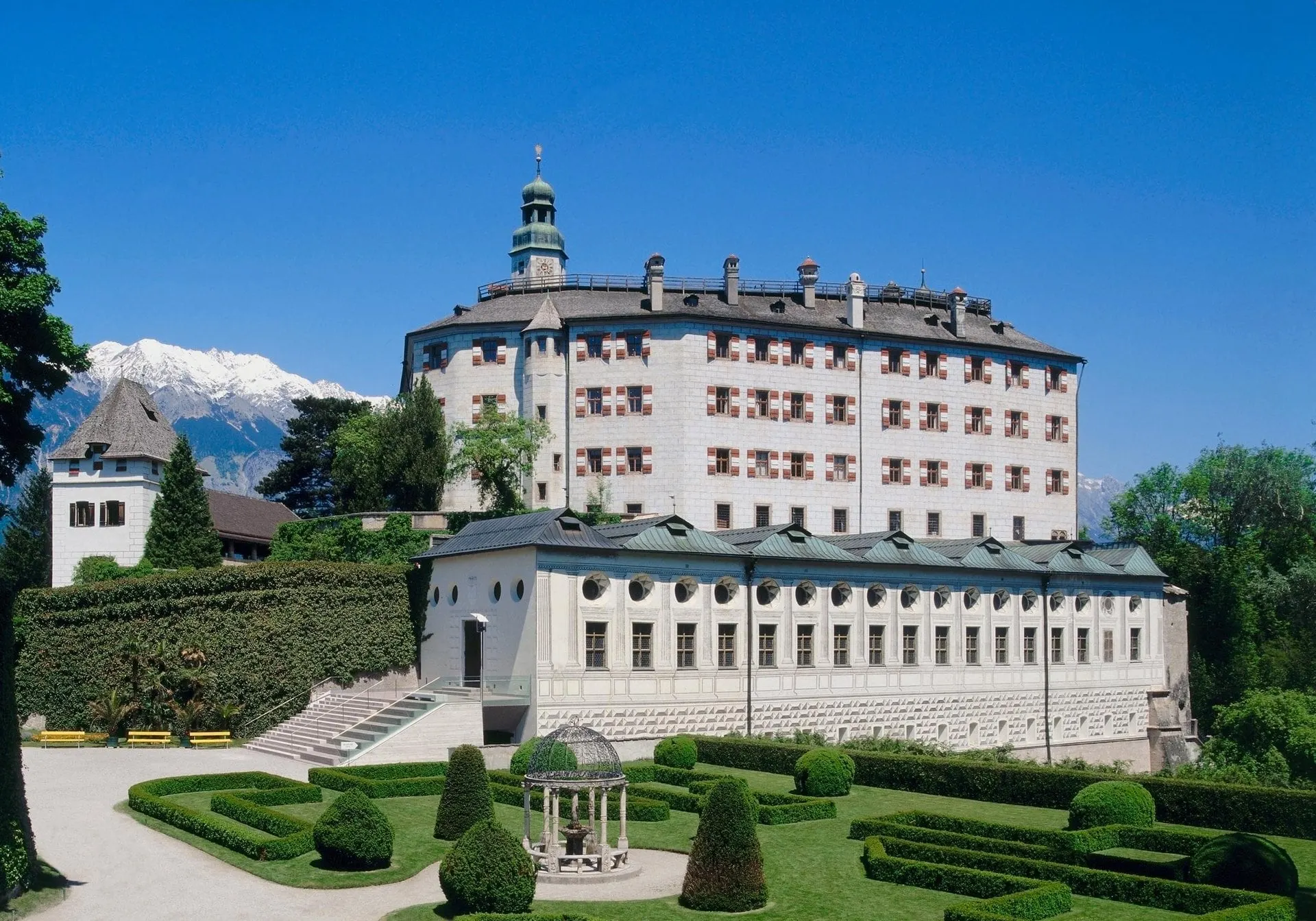 Ambras Castle and its formal gardens with the Nordkette behind