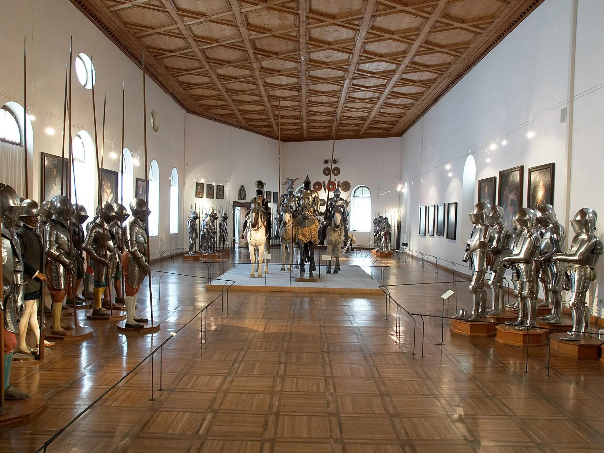Suits of armour and mounted knights in the Ambras Castle armoury