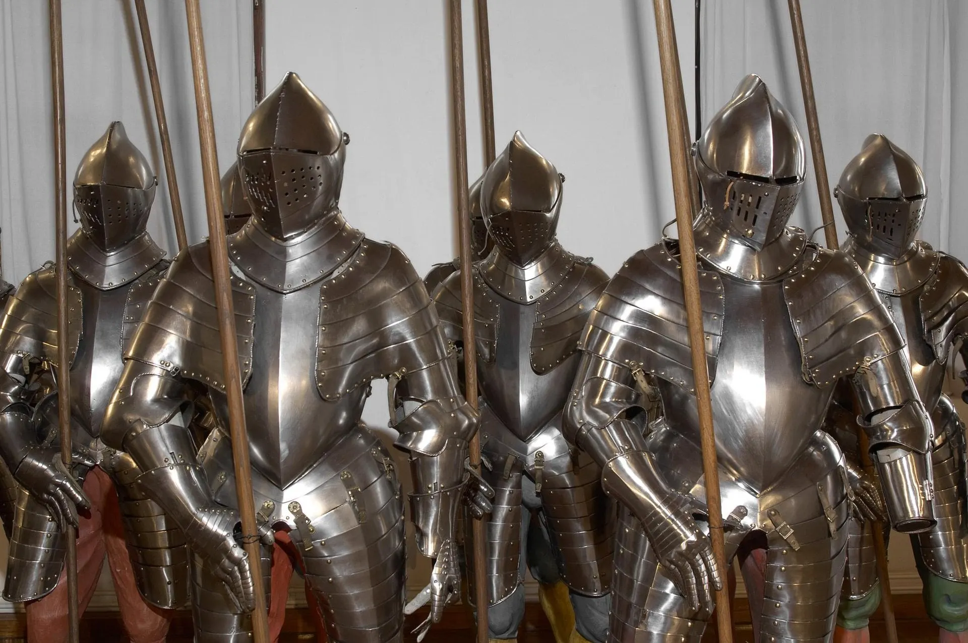 Rows of armour with lances in the Ambras Castle collection