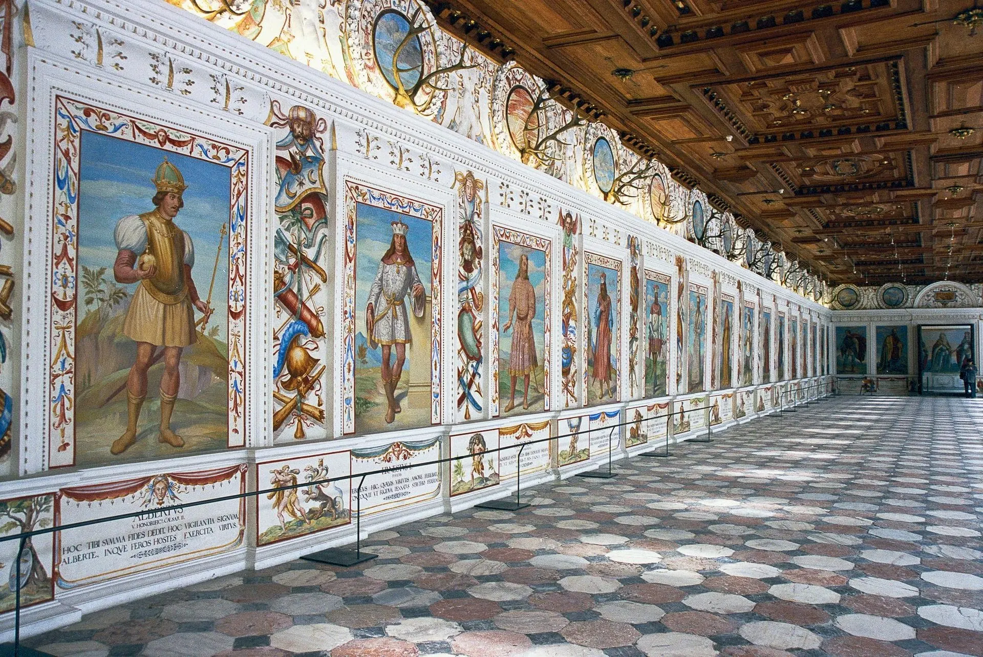 Spanish Hall at Ambras Castle with painted portraits and coffered ceiling