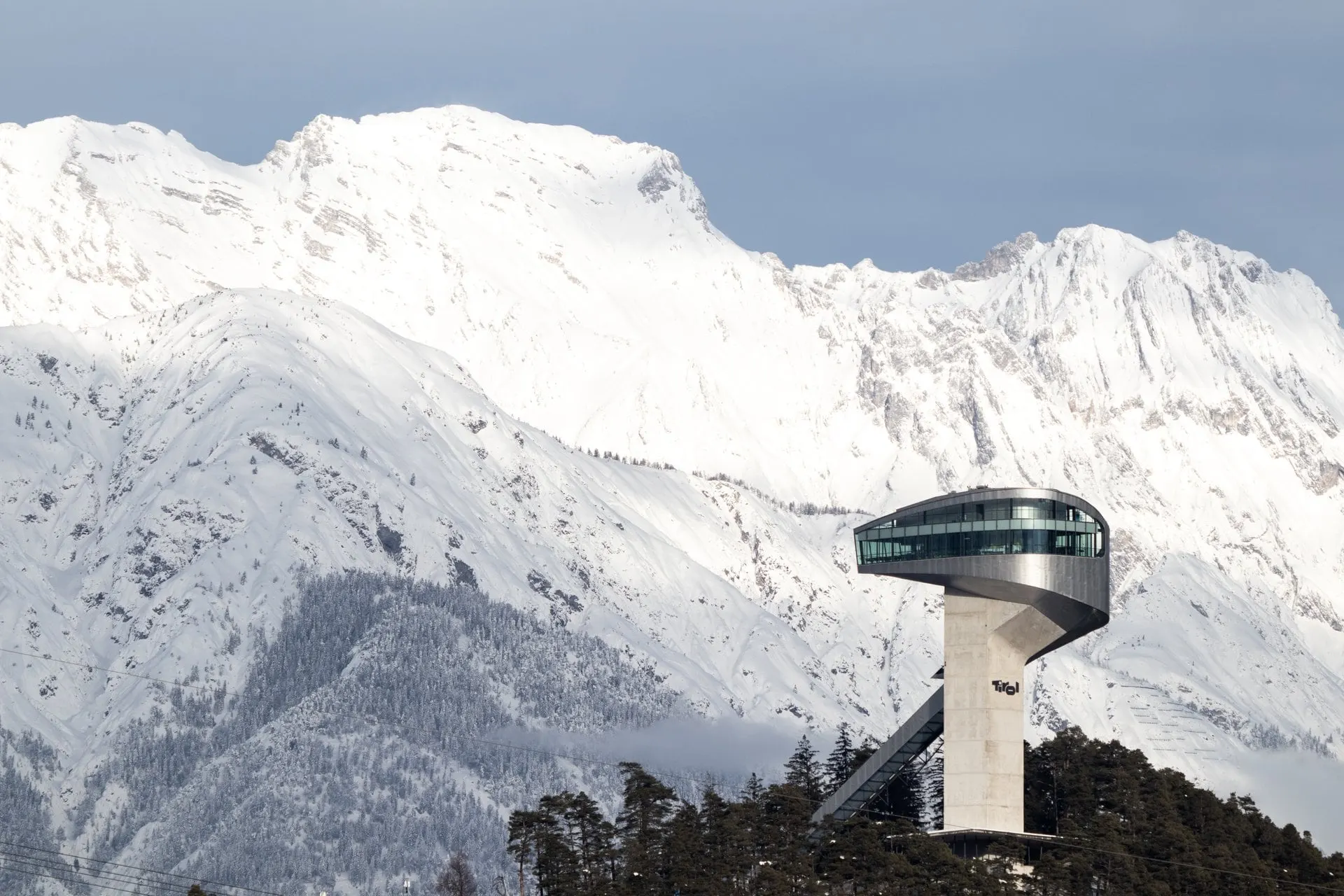 Bergisel ski jump tower below the snowy Nordkette
