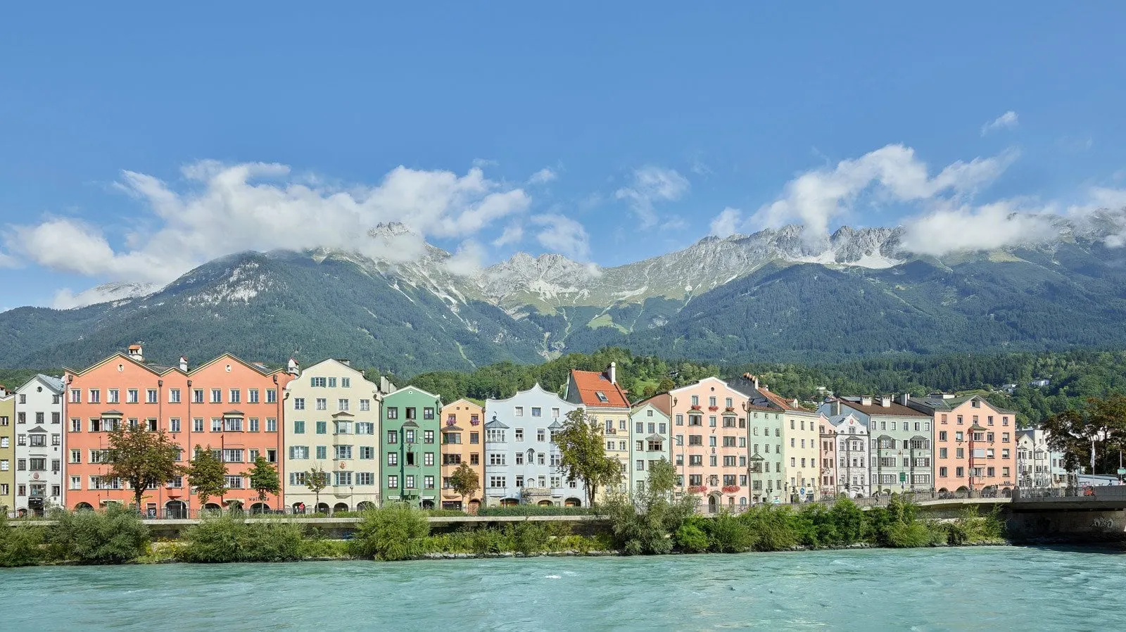 Colourful houses along the River Inn below the Nordkette