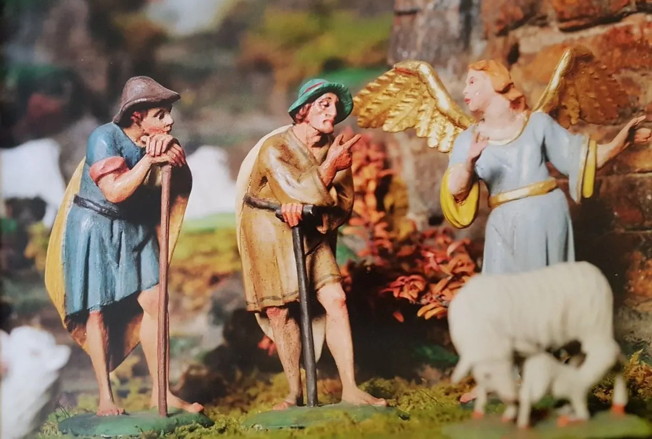 Nativity figures of shepherds and an angel