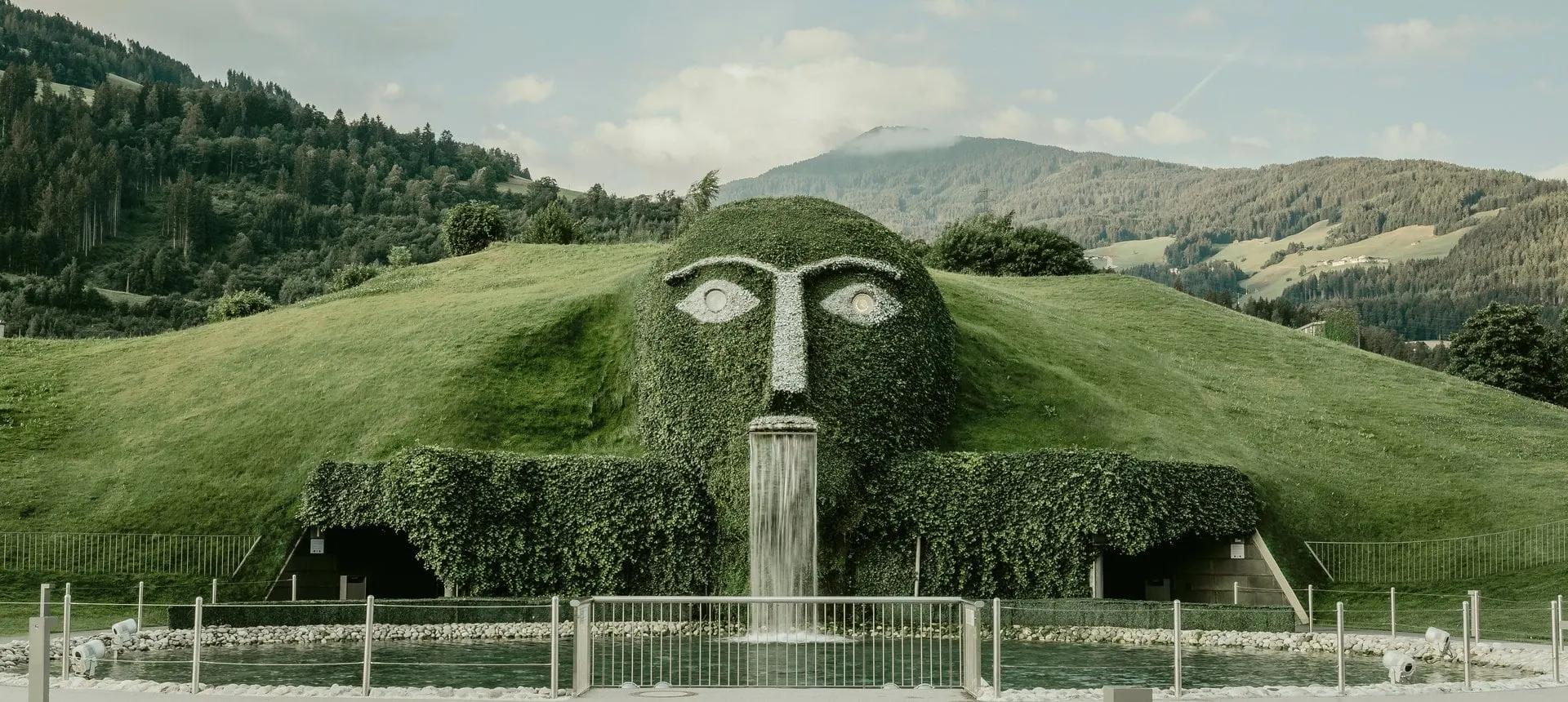 Giant head with waterfall at Swarovski Crystal Worlds in Wattens