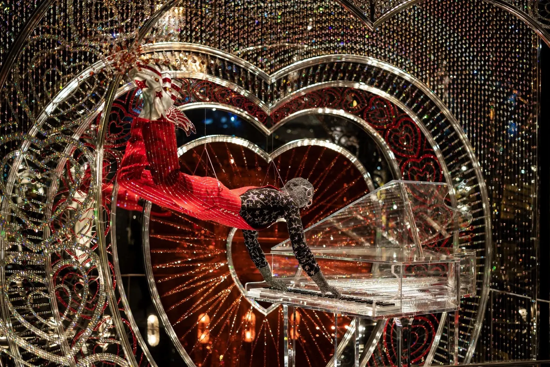 Crystal heart installation with a figure at Swarovski Crystal Worlds