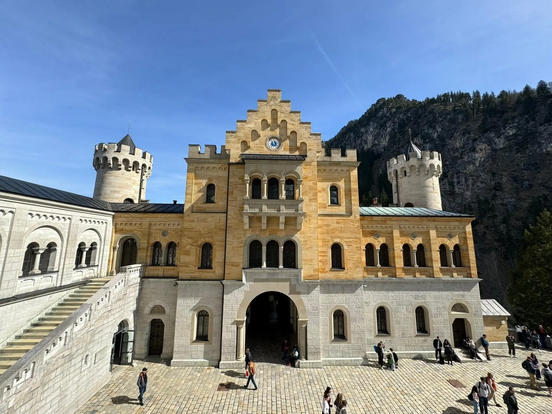 Inner courtyard of Neuschwanstein Castle with visitors