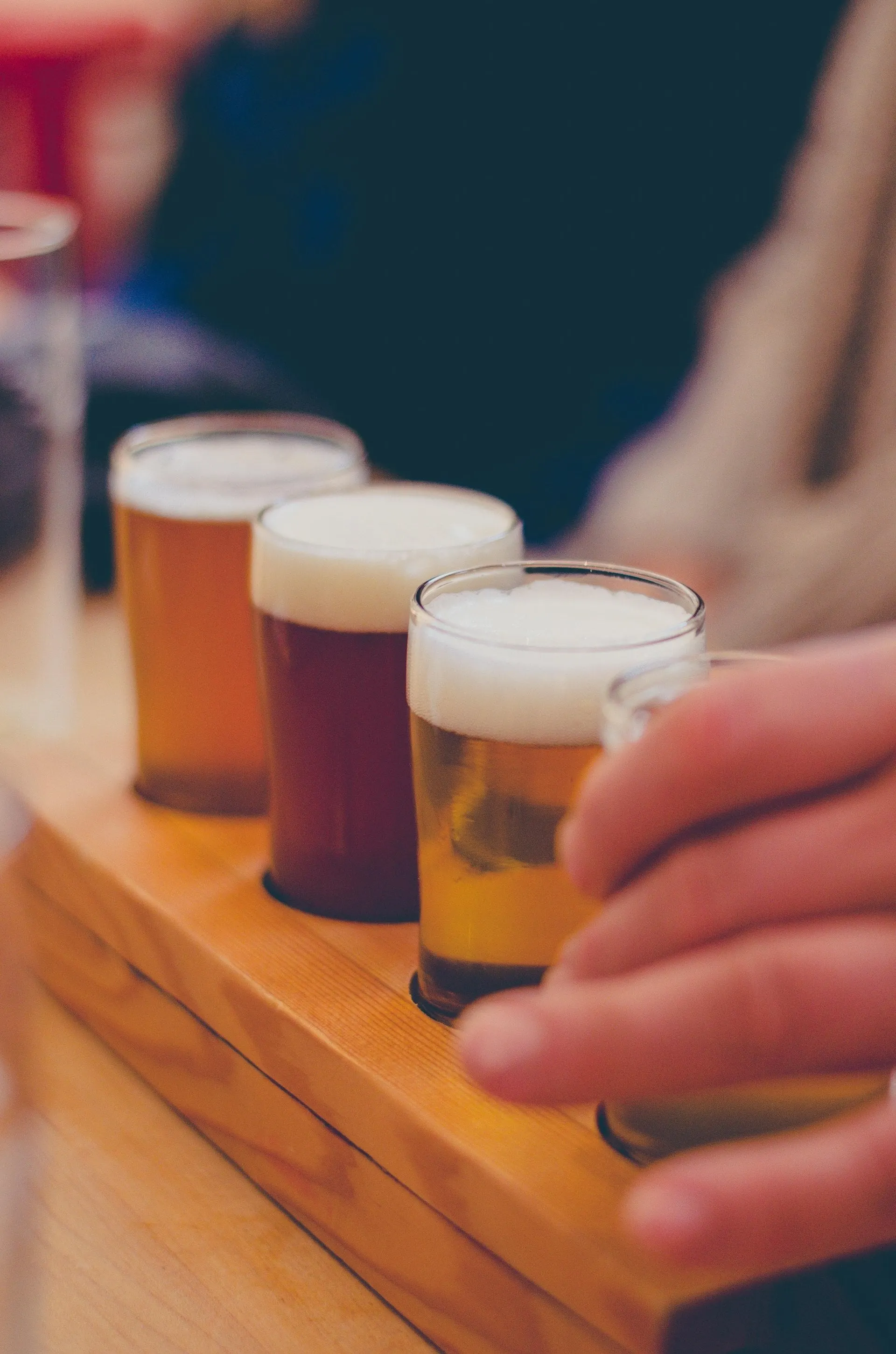 Glasses of local beer on a tasting board