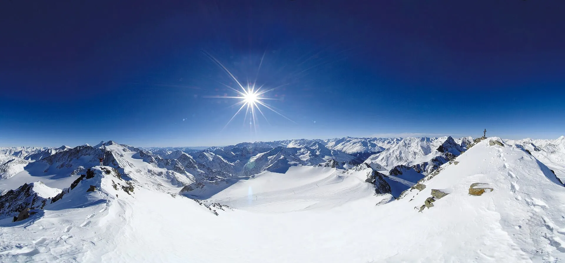 Ski slopes on the Stubai Glacier under a clear winter sky